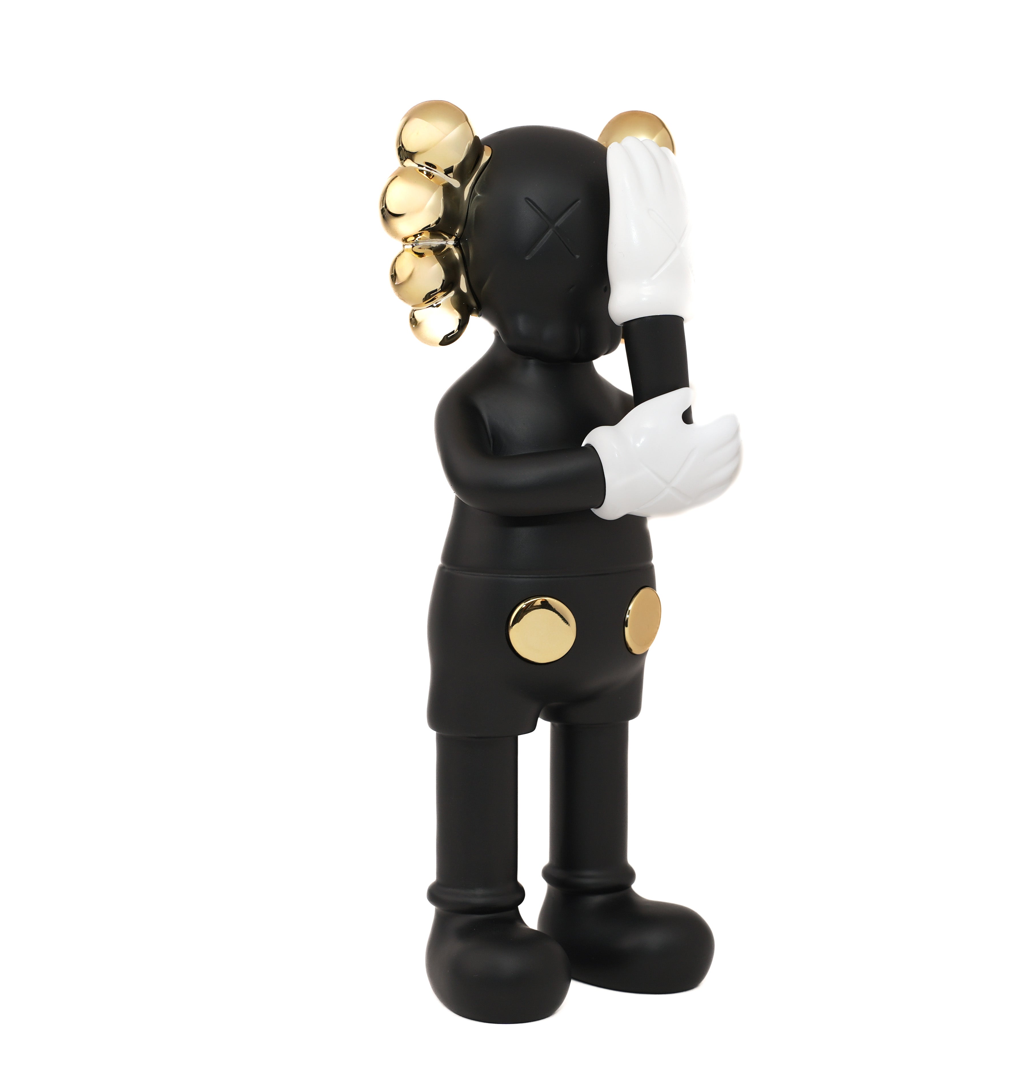 KAWS PARADO NEGRO CON DORADO